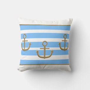 Cojín Decorativo ancla dorada fondo blanco azul