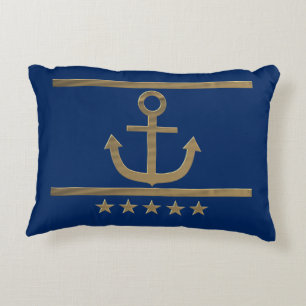 Cojín Decorativo ancla dorada sobre fondo azul marino