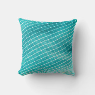 Cojín Decorativo Armario textil de fondo a cuadros.