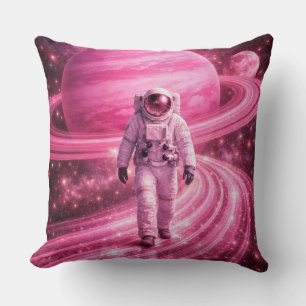 Cojín Decorativo Astronauta caminando sobre anillos rosados