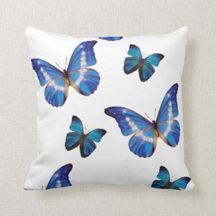 Cojín decorativo azul de las mariposas
