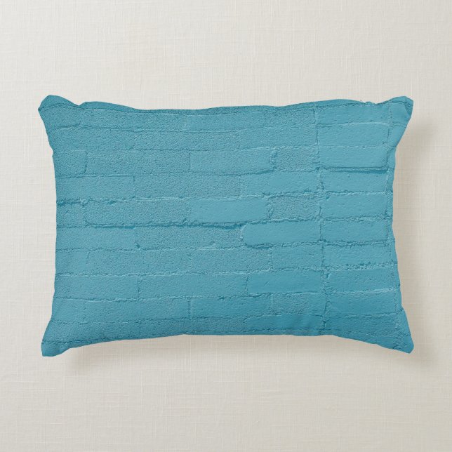 COJÍN DECORATIVO BRICANTES DE PARED AZULES (Anverso)