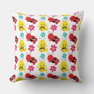 COJÍN DECORATIVO BUGS Y FLORES DE BEBÉS ROJOS Y AMARILLOS