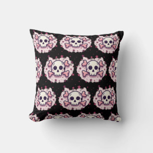 Cojín Decorativo Calavera y huesos cruzados rosa pastel