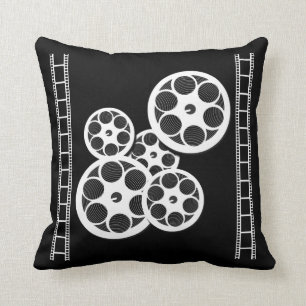 Cojín decorativo casero del cine con los rollos d