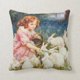 Cojín Decorativo Chica lindo alimentando los conejos