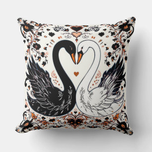 Cojín Decorativo Cisnes negros y blancos rodeados de diseños floral