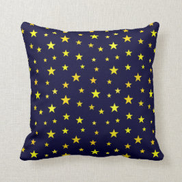 Cojín decorativo con estrellas sobre fondo azul ma