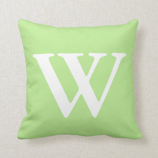 Cojín decorativo con monograma blanco de la verde