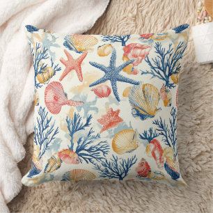 Cojín Decorativo Conchas de océano pastel con ramitas de coral deli