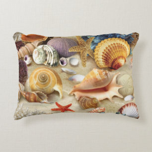 Cojín Decorativo conchas marinas en la playa