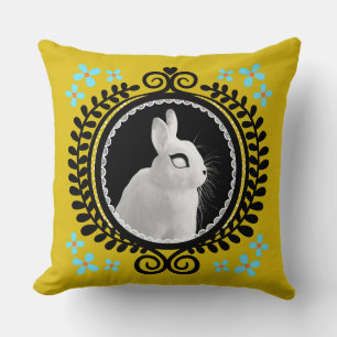 Cojín Decorativo Conejo Blanco Extraño: Amarillo, Negro y Azul Clar