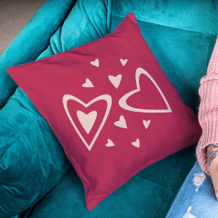 Cojín Decorativo Corazones nucleares - imagen magenta y rosa.