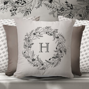 Cojín Decorativo Corona de hojas moderna que rodea la letra H