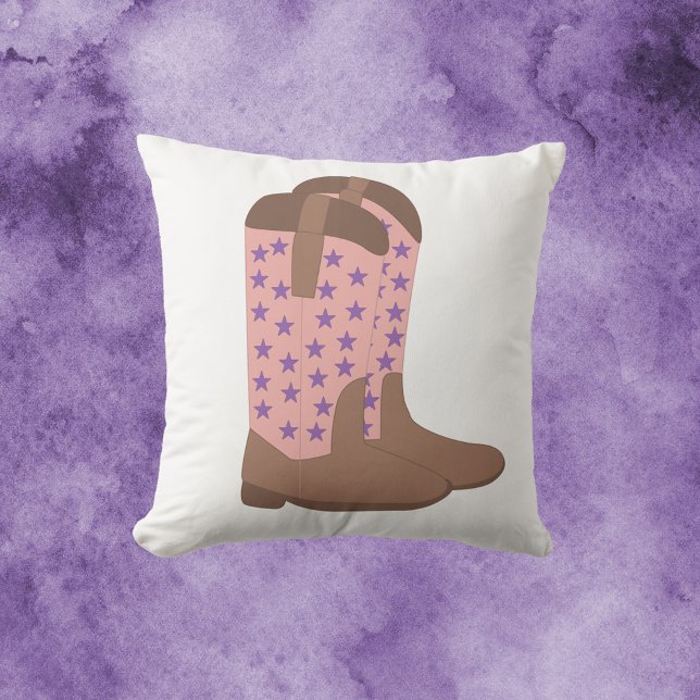 Cojín Decorativo Cowboy Boots Brown Pink Purple Stars (A throw pillow with a cowboy boot motif done in pink and brown with purple stars.)