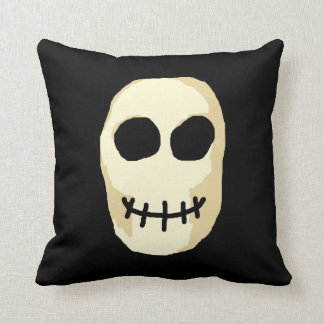 Cojín Decorativo Crema y cráneo negro.