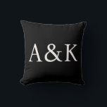 Cojín Decorativo Custom Initials on Black Wedding<br><div class="desc">This custom throw pillow features a clean, modern, and elegant design. Sample initials of the bride and groom are printed in the center in a sophisticated white font. The background is a solid black. You can personalize the pillow to include your own custom initials or other text of your choice....</div>