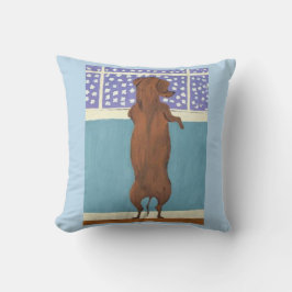 Cojín Decorativo Dachshund en la ventana viendo nevar