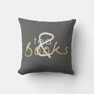 Cojín decorativo de dos té y libros