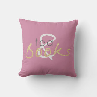 Cojín decorativo de dos té y libros