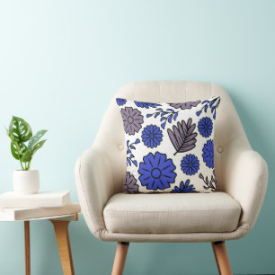 Cojín decorativo de flores azules y marrones