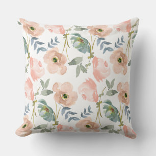 Cojín decorativo de flores rosadas de color acuáti
