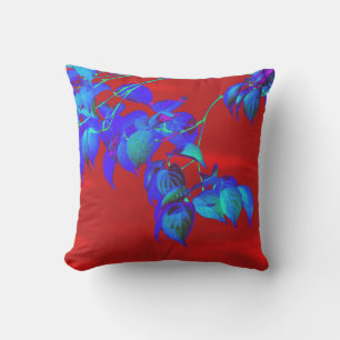 Cojín decorativo de hojas azules del cielo rojo