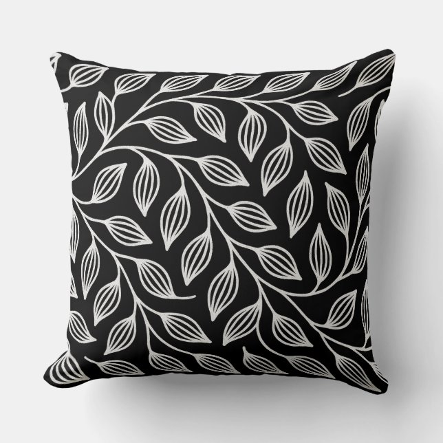 Cojín decorativo de hojas blancas y negras (Anverso)