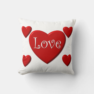 Cojín decorativo de los corazones rojos del amor