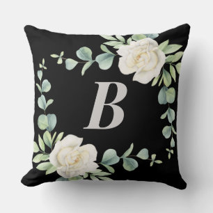 Cojín decorativo de monograma floral blanco, negro