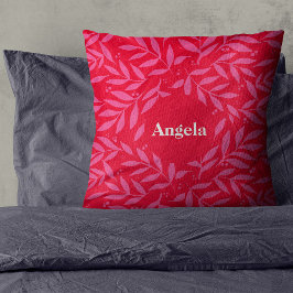Cojín decorativo de nombres de follaje rosa y rojo