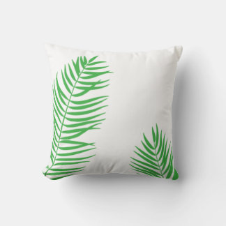 Cojín decorativo de silueta verde con borde de pal