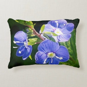 Cojín decorativo de tres flores azules