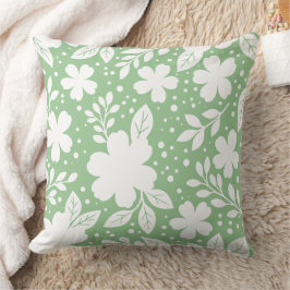 Cojín Decorativo Diseño floral blanco sobre fondo verde suave