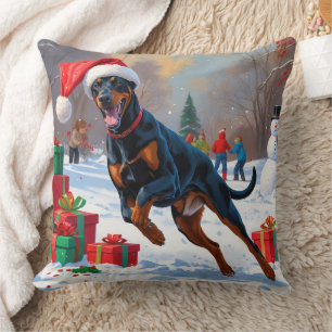 Cojín Decorativo Doberman corre en Nieve con Gorra Navidad