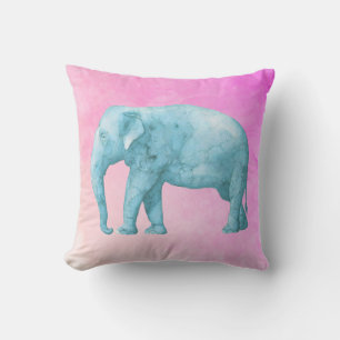 Cojín Decorativo Elefante de color azul claro sobre fondo rosado