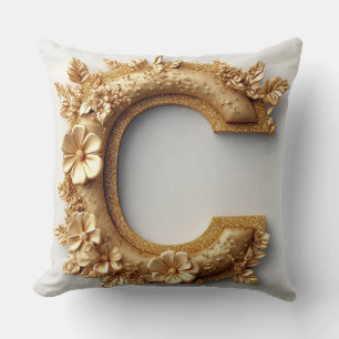 Cojín Decorativo Elegante letra dorada C con flores delicadas
