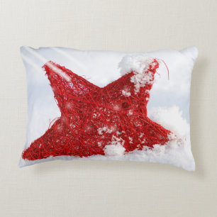 Cojín Decorativo Estrella roja en la nieve