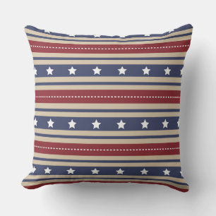 COJÍN DECORATIVO ESTRELLAS AZULES ROJAS Y FRANJAS PATRIOTAS