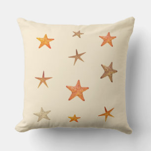 Cojín Decorativo estrellas del mar naranja y beige en marfil