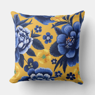 Cojín Decorativo Floral azul audaz y amarillo en un fondo amarillo