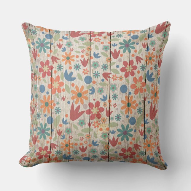 Cojín Decorativo Floral azul Naranja rojo curado en madera blanca (Anverso)