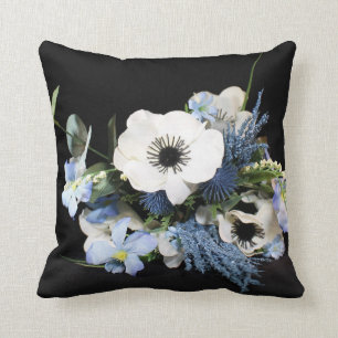 Cojín decorativo floral azul y negro
