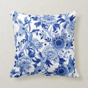 Cojín Decorativo Floral de ave china azul y blanca en el follaje 