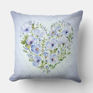 Cojín decorativo floral del corazón azul