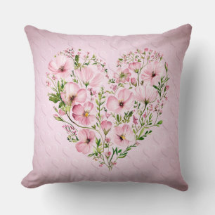 Cojín decorativo floral del corazón rosado