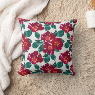 Cojín Decorativo Flores rojas en blanco.