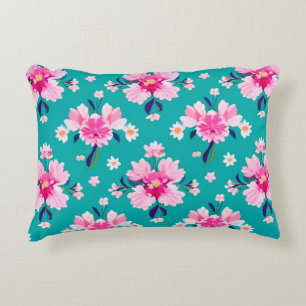 Cojín Decorativo Flores rosadas y hojas sobre fondo azul turquesa