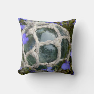 Cojín Decorativo Flotador pesquero entre flores