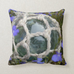 Cojín Decorativo Flotador pesquero entre flores